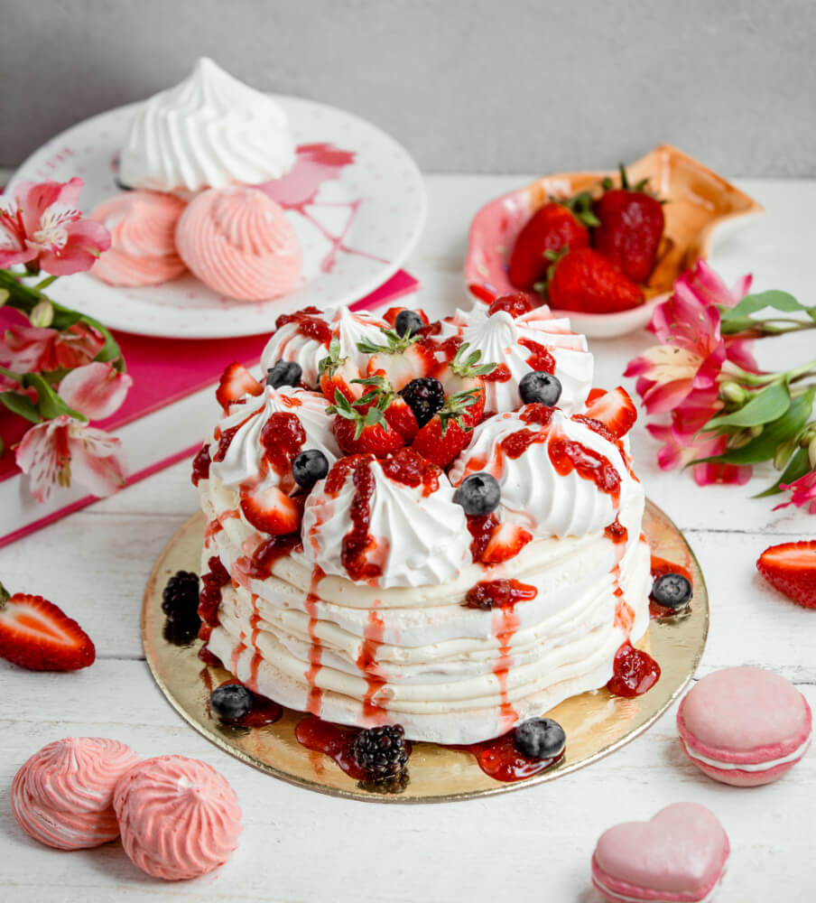 cream-strawberry-meringue-cake-sprinkled-with-strawberry-syrup