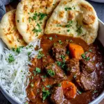 Slow braised spiced beef curry with garlic naan